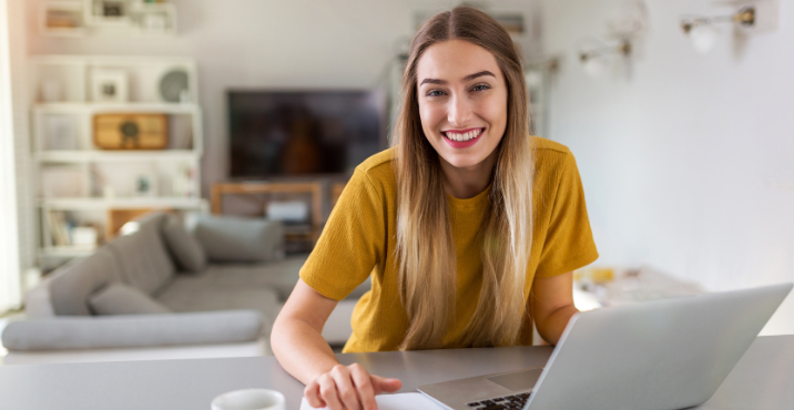 ai for tefl teachers, teacher smiling laptop