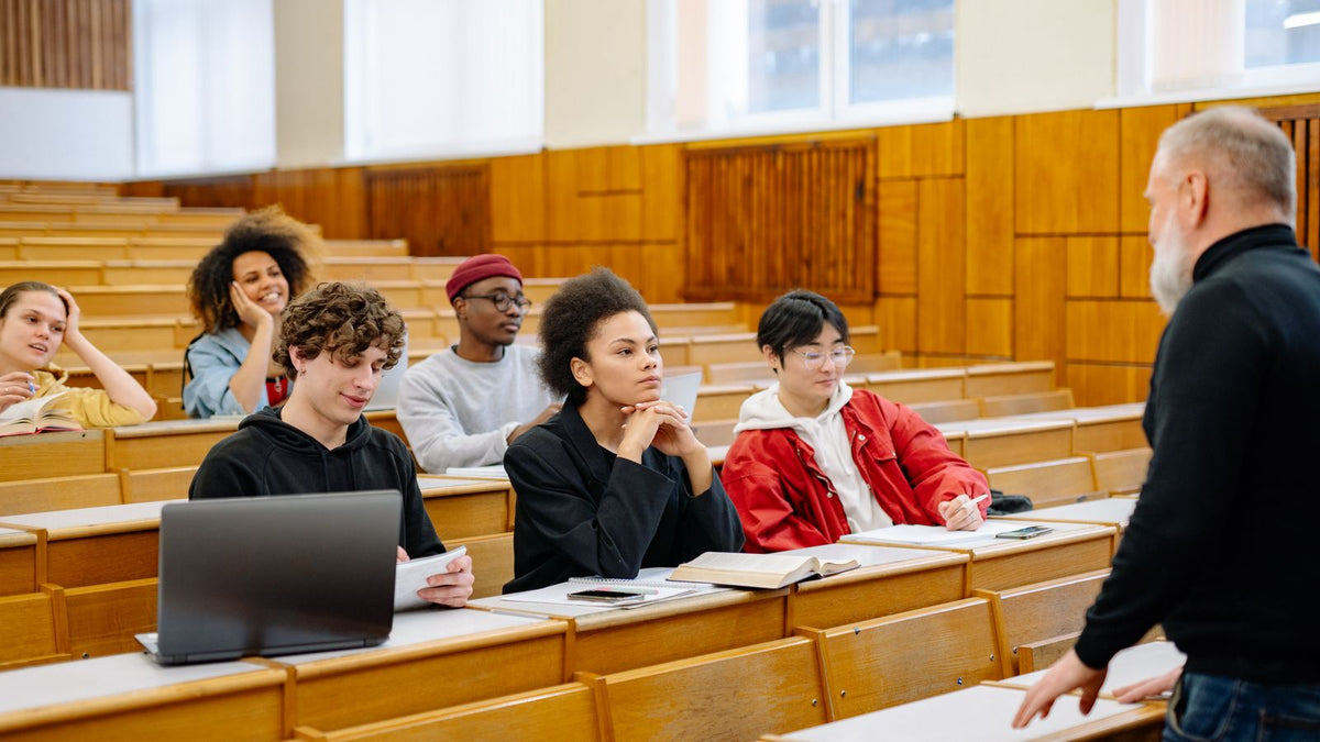 Students sitting inside a classroom during an EFL English lesson abroad, illustrating the ESL vs EFL distinction
