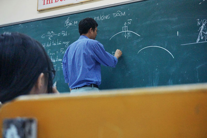 New TEFL teacher leading an English class abroad after a successful job search
