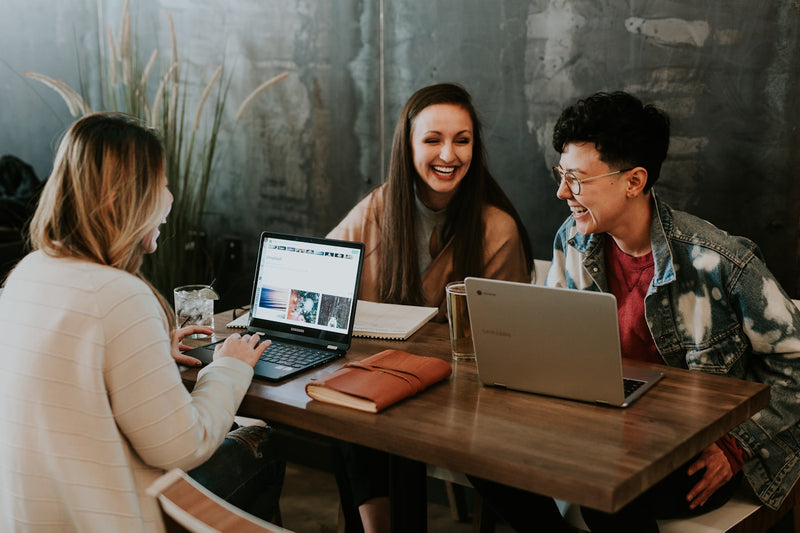 Teaching English online without a degree from a home desk setup with laptop and notebook
