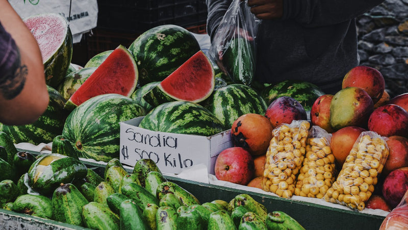 Fresh fruit in crates at a Costa Rica produce market, a key part of an English teacher's grocery budget
