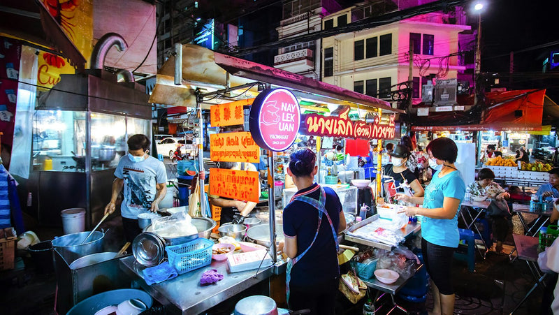 Street food stall in Bangkok's Chinatown, where English teachers in Thailand eat for a few dollars a meal