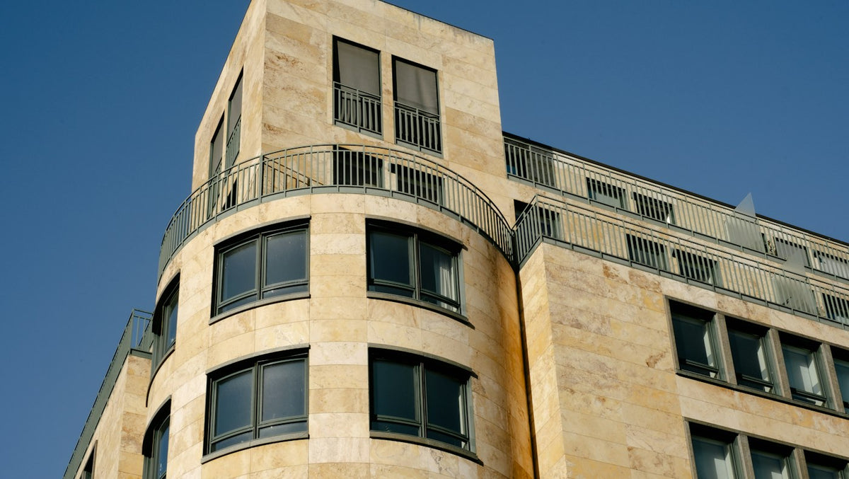 Residential apartment building with balconies in a German city where English teachers rent flats