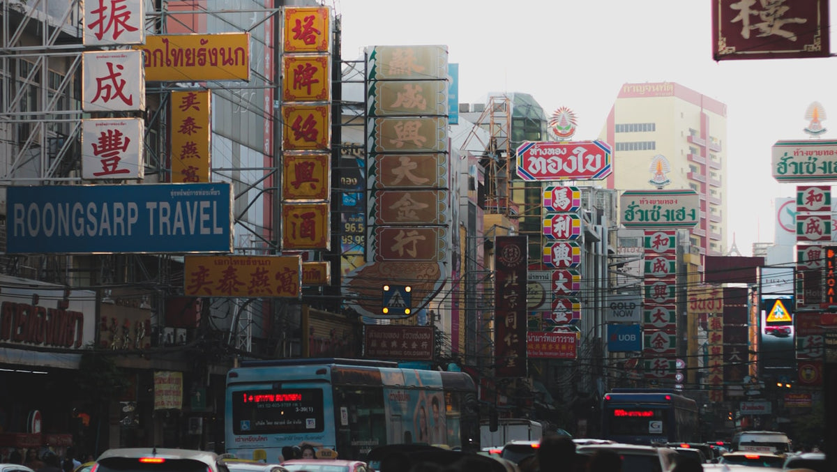 Yaowarat Road in Bangkok Chinatown at dusk, a hub for English teachers working in Thai language centres