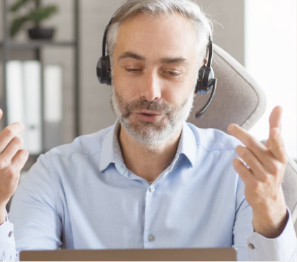 Business English teacher conducting a professional online lesson focused on workplace communication and corporate English skills.