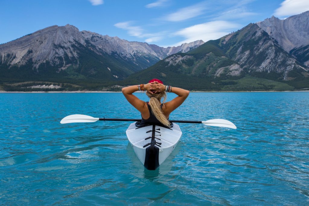 A woman canoeing 