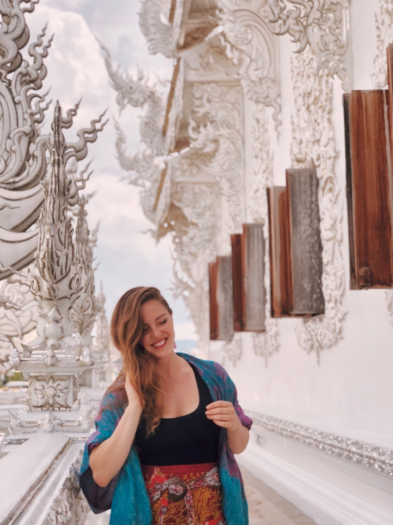 Briana visiting the White Temple in Thailand.