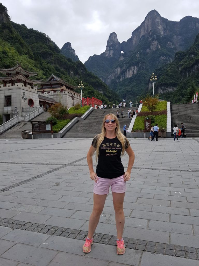 Tetiana standing by stairs in China