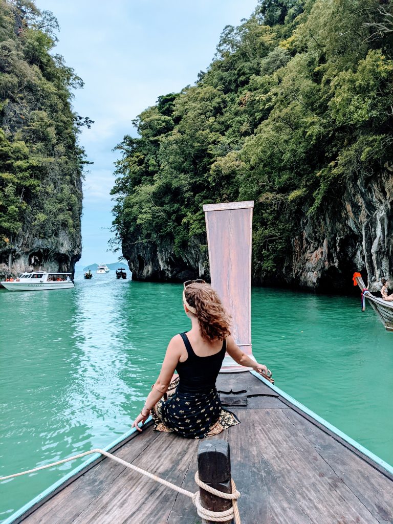 Woman from behind on Thai boat 