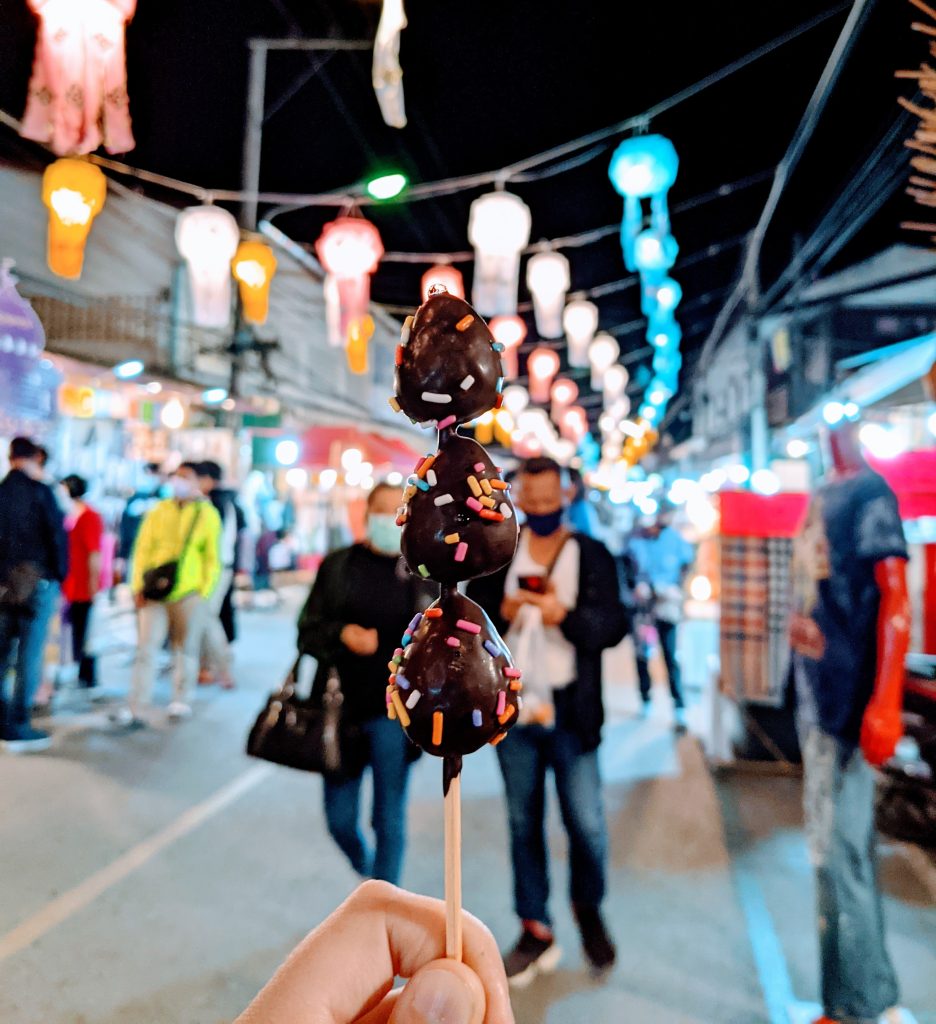 Marschmallow brochette in street food market in Thailand